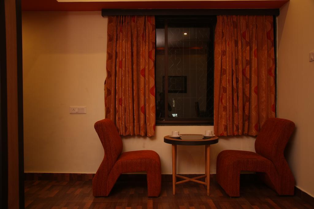 Hotel Trimoorti Calcutta Chambre photo
